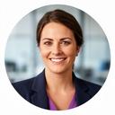 Portrait of Críona Otoole, Operations Director at a Dublin pharmaceutical firm, smiling warmly in a professional setting